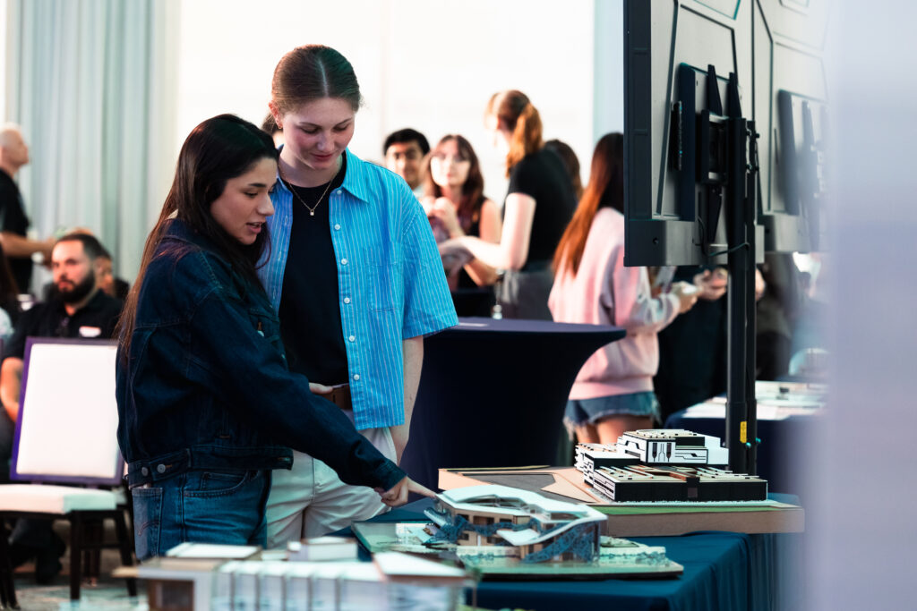 Two people at the architecture showcase