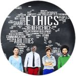 Group of people in font of ethics-themed word cloud
