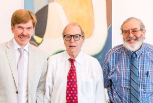 Irving Gussow (center), president of Temple Shalon of Deltona, poses with Kenneth Hanson and Jeff Golub of UCF's Judaic Studies program