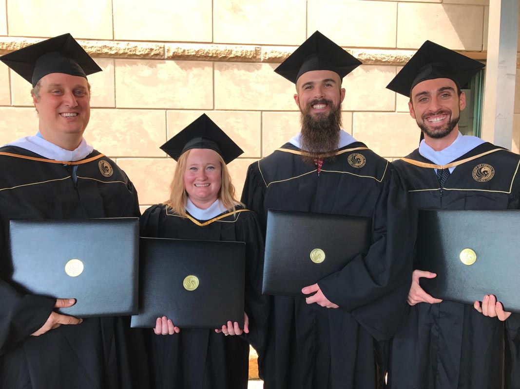 Summer 2017 History MA graduates: Kevin Mercer, Erin Shreve, Ian Marsh, and Ben DiBiase