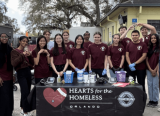 H4H Sunday screening family photo in said unmistakable maroon shirts.