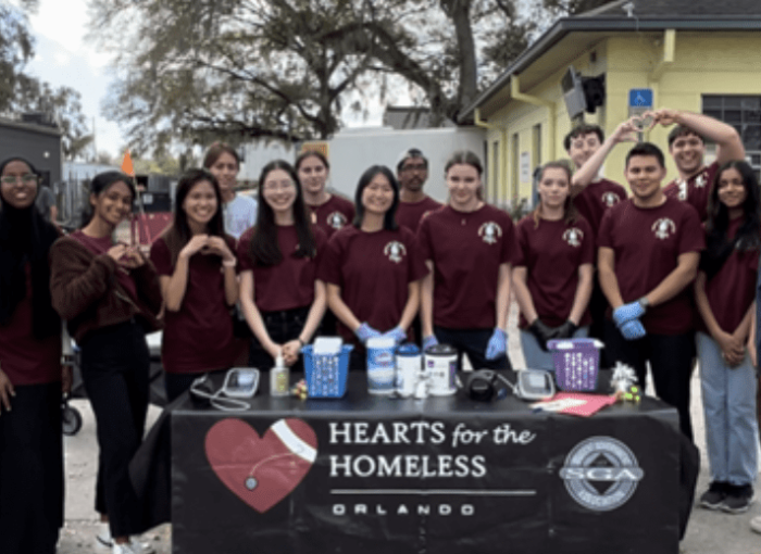 H4H Sunday screening family photo in said unmistakable maroon shirts.