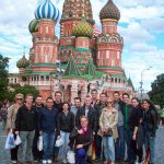 UCF study abroad group poses in front of St. Basil Cathedral.
