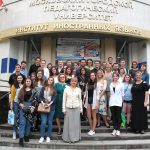 UCF study abroad group poses in front of a building at Moscow City University.