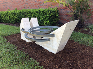 Public Art Sculpture located at UCF outside of the Visual Arts building. Cast concrete and aluminum from the 1970's.