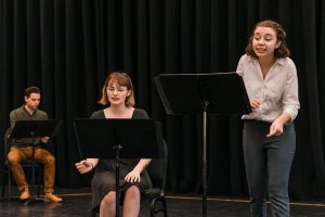 Students rehearse for a staged reading at Pegasus PlayLab