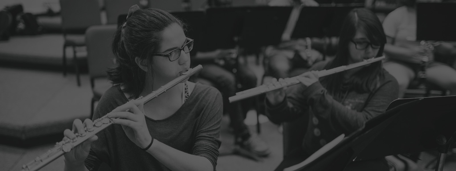 Students performing with flutes