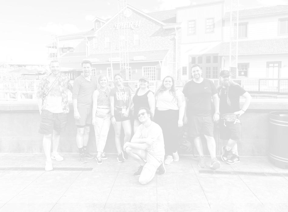 Faded background image of student group at Universal Studios Orlando