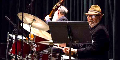 Drummer and bassist for The Jazz Professors rehearse