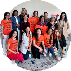 A group of women wearing shirts that say 'Empowered Women Empower Women'