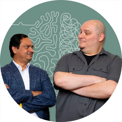 Danish Bhatti, Associate Professor of Medicine, poses with Luis Favela, Associate Professor of Philosophy and Cognitive Sciences