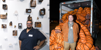 Photo of Alexander Alvarez and Jim Wysolmierski standing next to their art