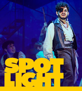 Actor in pirate garb overlaid with SPOTLIGHT in yellow type