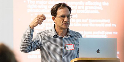 graduate faculty Barry Mauer speaking