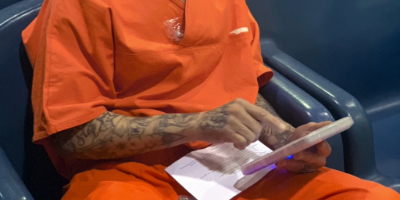Incarcerated person with electronic tablet