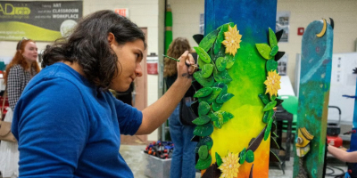 A student works on a sculpture
