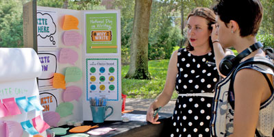 Participant and observer review presentation during writing event
