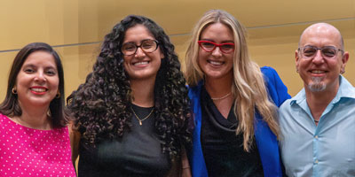 Women's and Gender Studies faculty members pose with former students.
