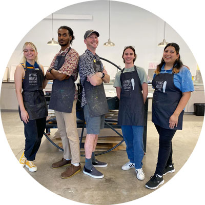 Flying Horse Editions interns pose in print studio