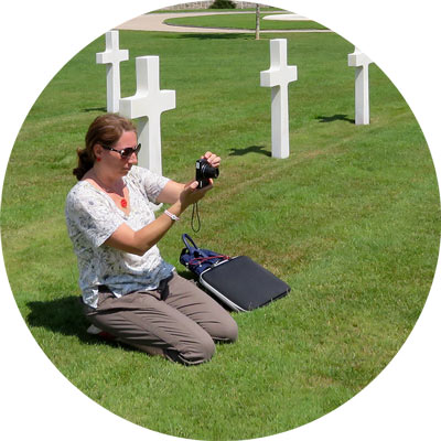 Amelia Lyons takes photos in cemetery