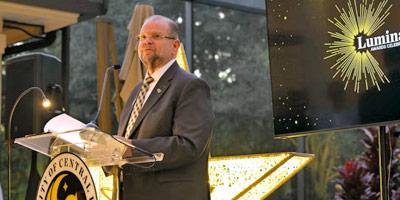 UCF President Alex Cartwright speaking at a podium