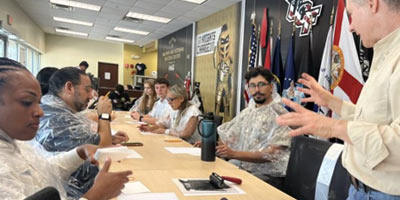 Group discussion at a long conference table