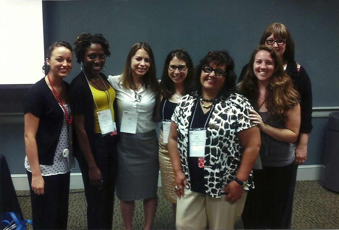 Mentors pose with program director