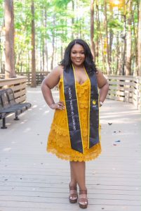 Kirsten Cherry with graduation sash