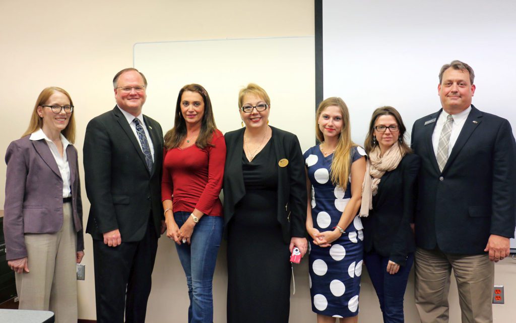 Dean Jeff Moore and Modern Languages professor Alla Kourova thank Julia Rosengren for her gift to the program.