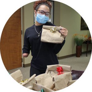 Young woman prepares care packages