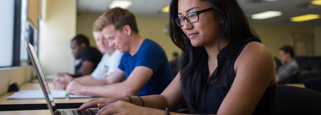 student using laptop