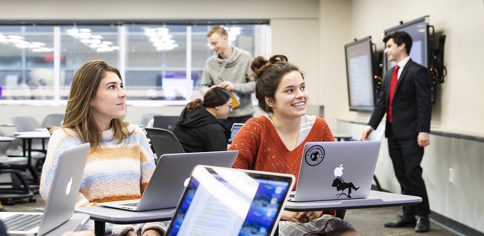 Students at laptop computers in writing center