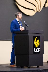 Faculty presenter at UCF podium