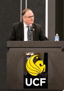 Jeff Moore, Dean of the UCF College of Arts and Humanities, speaks from podium