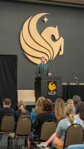 Faculty presenter at UCF podium